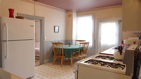 Kitchen stocked with essentials for your stay.
