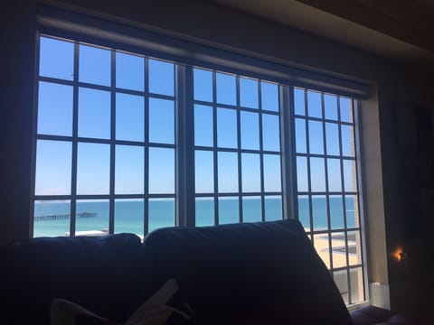 Expansive Gulf and pier view taken while sitting on the sofa