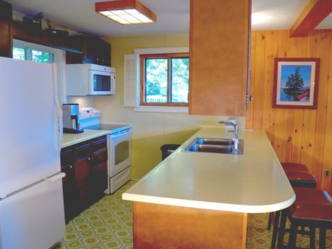 Kitchen - Fully equipped for extended stays.