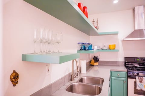 Cups, glasses, plates, bowls and utensils are all included.