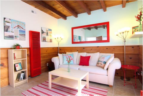 The living area, bright and airy, complete with a sofa sleeper, Wi-Fi & Apple TV