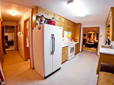 Centrally-located kitchen for easy entertaining and cooking!