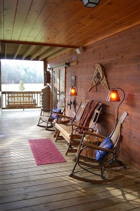 Rock , swing , or glide while watching and listening to the river.