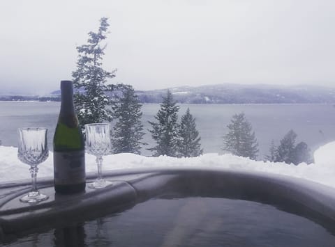 Warming up in the hot tub as the snow falls.  