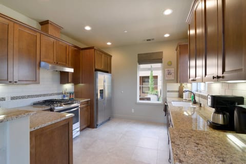 The kitchen is well equipped and stocked to prepare gourmet meals.