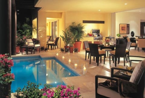 Private outdoor area with plunge pool and Viking grill station