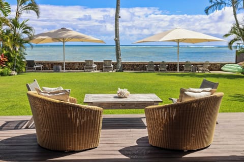 Peaceful seating area overlooking the sparkling blue bay.