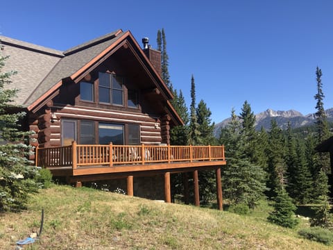 Sumer view of cabin, deck, and view