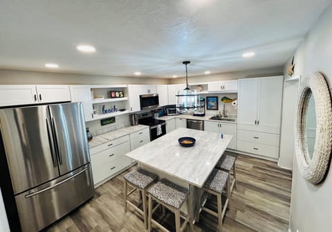 Light and bright. Island is great for eating, doing puzzles and playing games. 