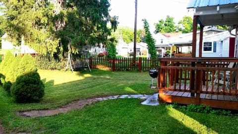 Area, front yard, garden swing, we are NOT in the woods. There are homes ne
