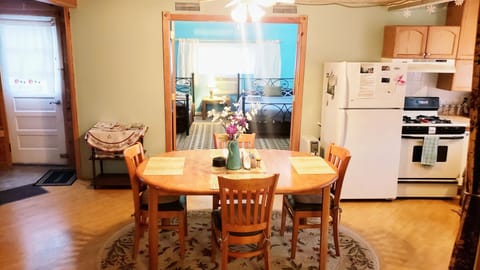 Dining area. kitchen and bedroom 1 preview.  