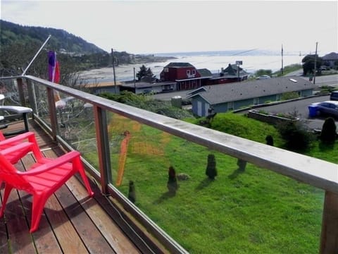 Ocean view; deer on the little knoll. In Yachats the wildlife comes to you!