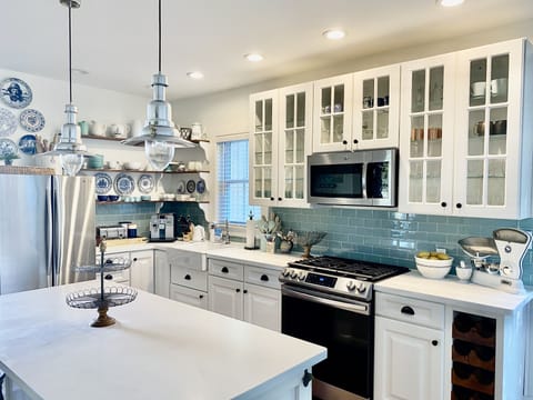 Large, well equipped and fully stocked gourmet kitchen.