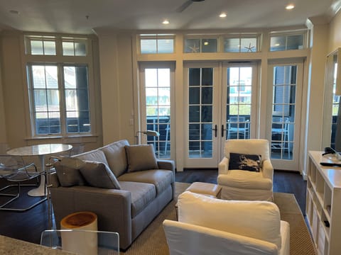 Living/dining with curved balcony overlooking the Square
