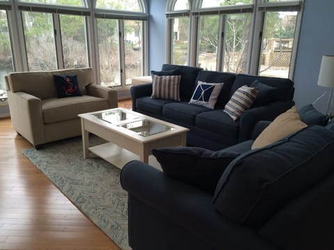Living Room with all windows on 2 sides for water view of the lake