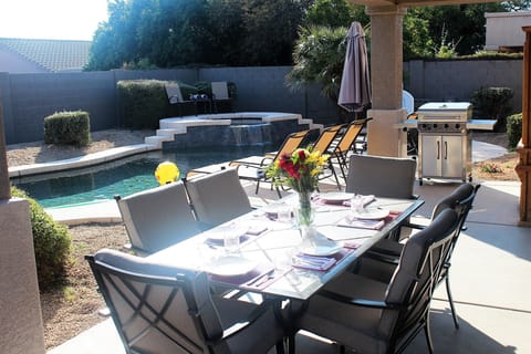Large Patio table, Lots of Lounge Chairs, New Stainless Steel barbecue