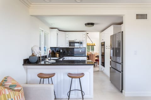 Well appointed Kitchen with 2 stoves, microwave, dishwasher & more