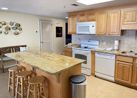 Island allows for easy food preparation for group. 