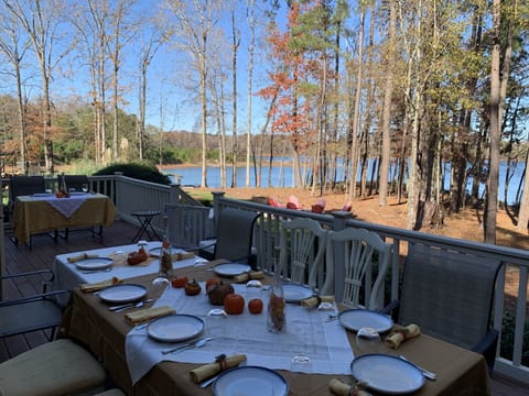 Plenty of space on the deck for a socially distanced meal overlooking the water