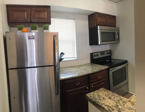Well equipped  galley style kitchen also has 5x7 walk-in pantry closet