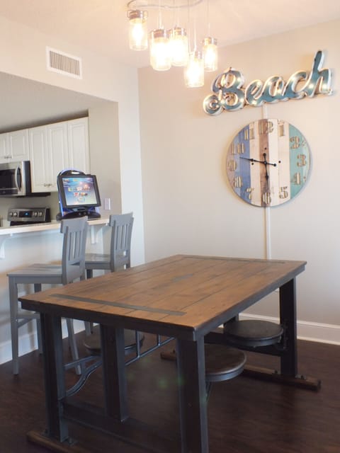 Check out this fun dining room, with cafeteria style table w/built in stools!