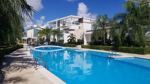 Costa Hermosa pool for owners & guests. Community Grill available for guest use