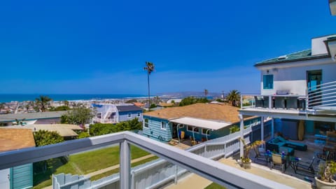View from 5th detached Bedroom. Back Deck of House, BBQ, Outside Table for 8