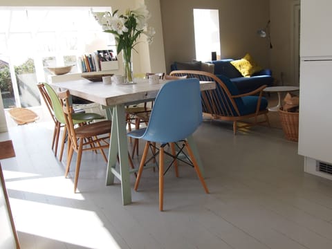 Open plan dining area from kitchen and into living room