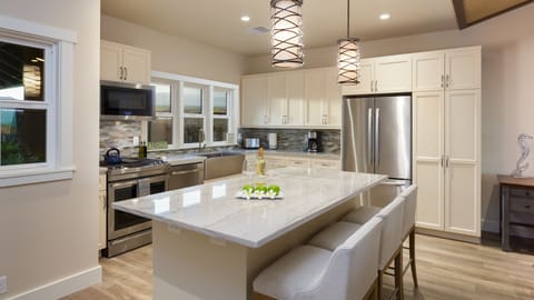 Gourmet kitchen with gas appliances - not common in Hawaii
A great assortment of spices and oils are proved for cooking.