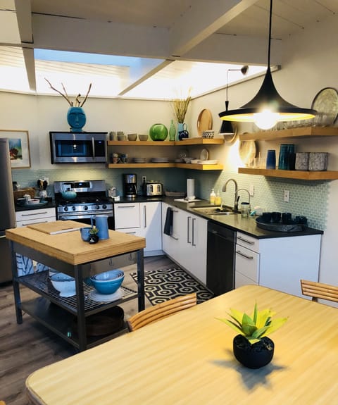 Well stocked, light -filled kitchen.