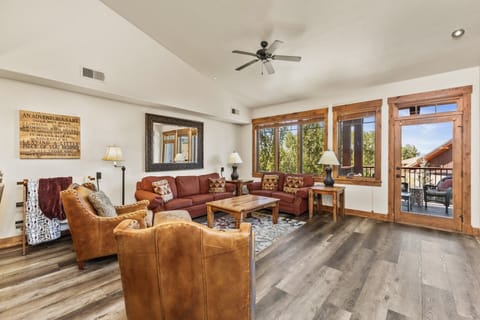 Spacious Living Room with vaulted ceilings and leather furniture
