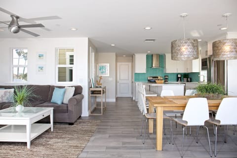 Upper unit: 3rd level - dining, kitchen and living area (with nice TV and comfortable couch)