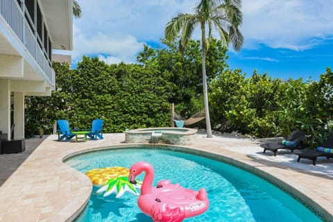 Sirenia Cove Resort Style Backyard Beach with Hammock, Hot Tub, and Htd Pool