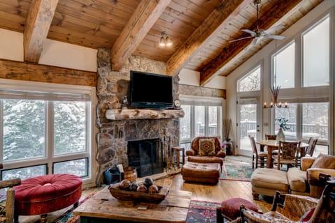 Large HDTV, Wood Burning Fireplace and Vaulted Ceilings