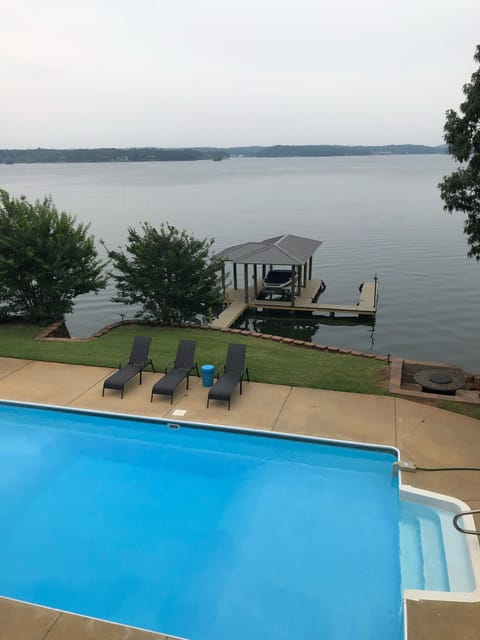 3 chairs to layout!  Good view of new boat dock and fire pit.