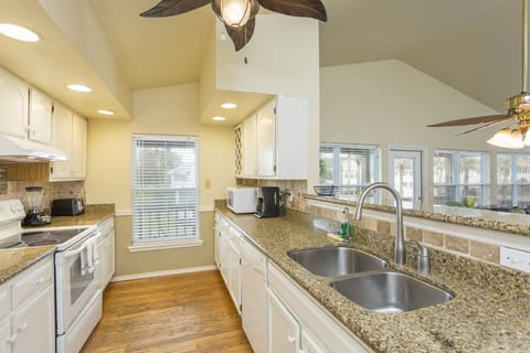 Kitchen is fully stocked with pots, pans, utensils and dishware for your convenience.