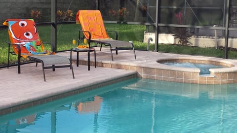 SOUTH facing pool!  Plenty of lounge chairs and tables. New pool/spa heater 2023