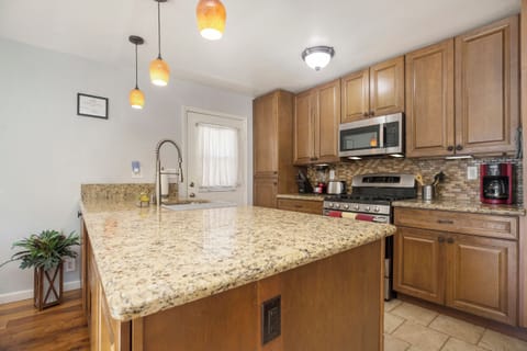 Prepare your own meal in this spacious and well equipped kitchen. Permit #str21-1275