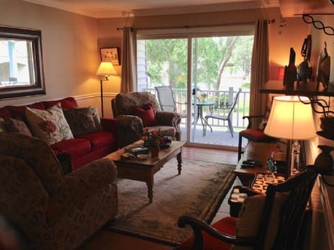 Comfortable living area w/stnd size sofa. Pull out bed. Beachy but not 2 beachy!