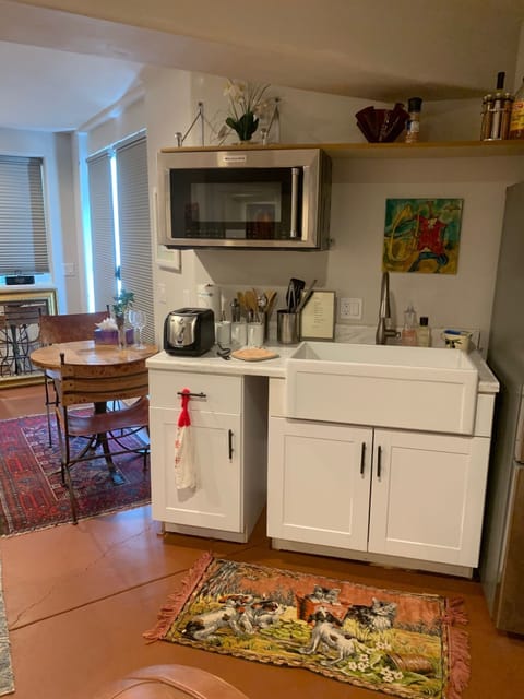 Farmhouse sink, microwave, full size LG fridge with ice maker
