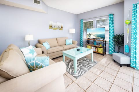 Living Room with walk out patio - 
Sandpiper Cove Resort 9106 Holiday Isle Destin Florida Vacation Rentals