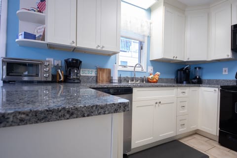 Kitchen was updated in 2019. Repainted 2023 to lighter blue than seen here