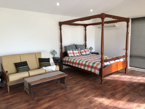 Four poster bed with lake view