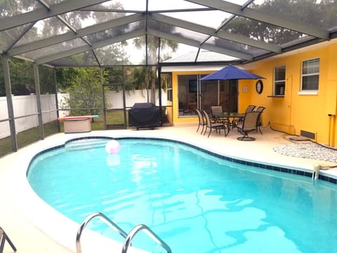 Lounge Poolside with Friends and enjoy a great BBQ