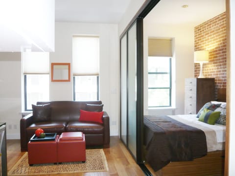 Living Room with Full Size Sofa Bed & Bedroom with Queen Size Bed