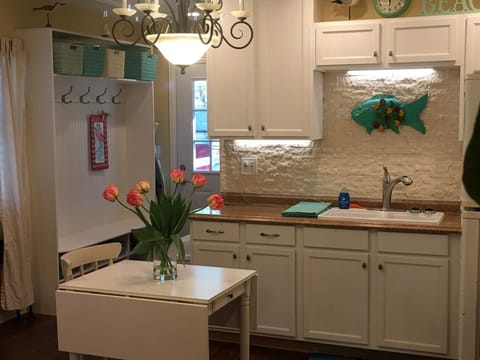 Open closet by the entry door.