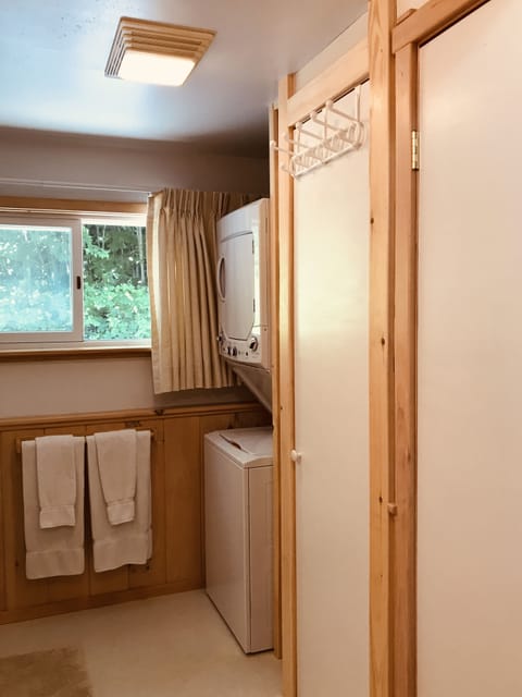 bathroom with washer and dryer
