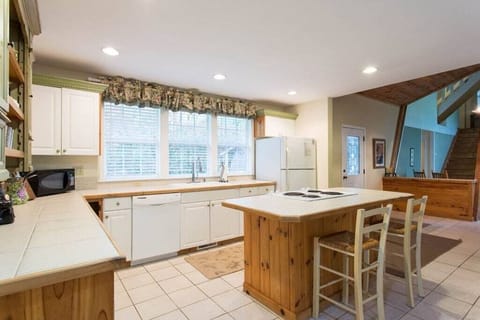 On one side of the door is the kitchen. 