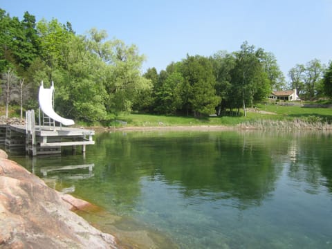 view from the point of the dock beach and house