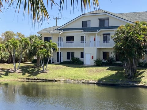 First floor unit facing lagoon and palm trees